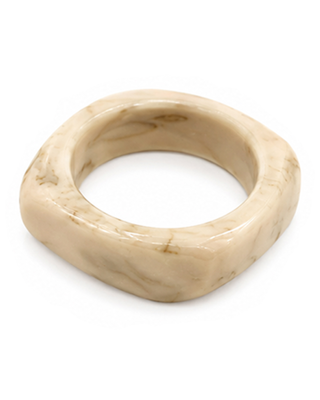 Pulsera Carey: pulsera rígida tipo brazalete con efecto carey jaspeado en tonos marfil y marrón suave de Quiles_Shop.