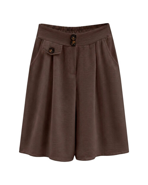 Bermuda Capri: falda pantalón de diario color marrón en viscosa fluida elástica con bolsillos, botones decorativos de carey y cinturilla trasera elástica de Quiles_Shop.