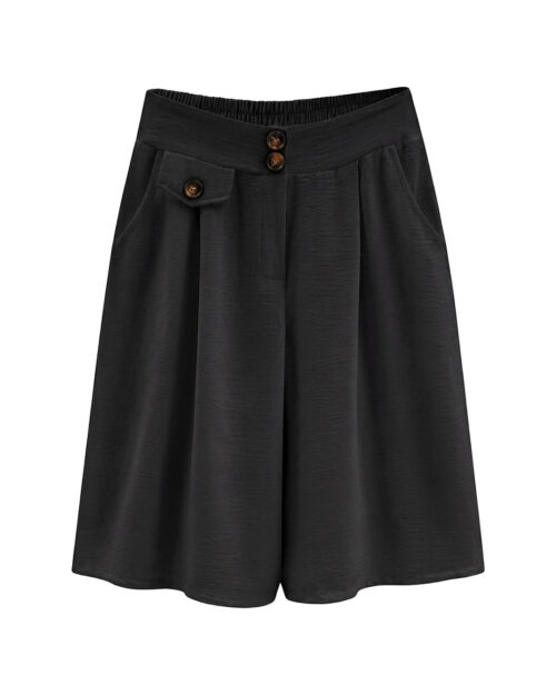 Bermuda Capri: falda pantalón de diario color negro en viscosa fluida elástica con bolsillos, botones decorativos de carey y cinturilla trasera elástica de Quiles_Shop.