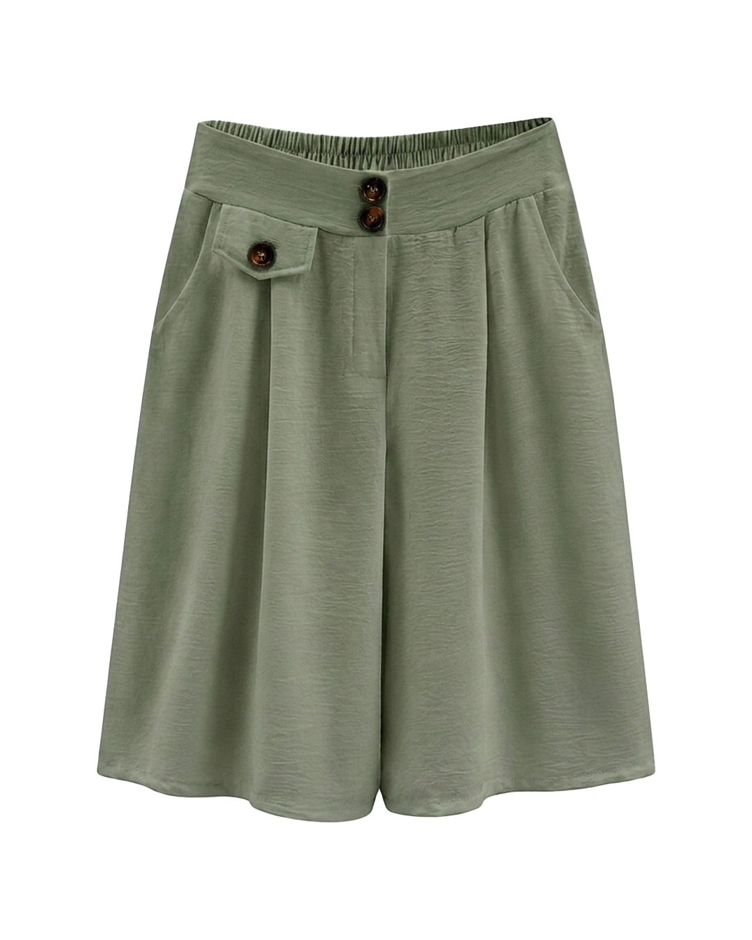 Bermuda Capri: falda pantalón de diario color verde en viscosa fluida elástica con bolsillos, botones decorativos de carey y cinturilla trasera elástica de Quiles_Shop.
