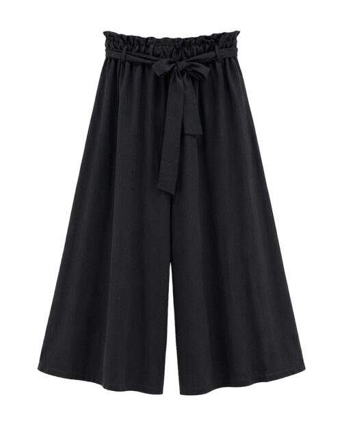 Pantalón Córcega: pantalón color negro de pata ancha en viscosa fluida y elastano con cintura elástica tipo paperbag y lazo de Quiles_Shop.