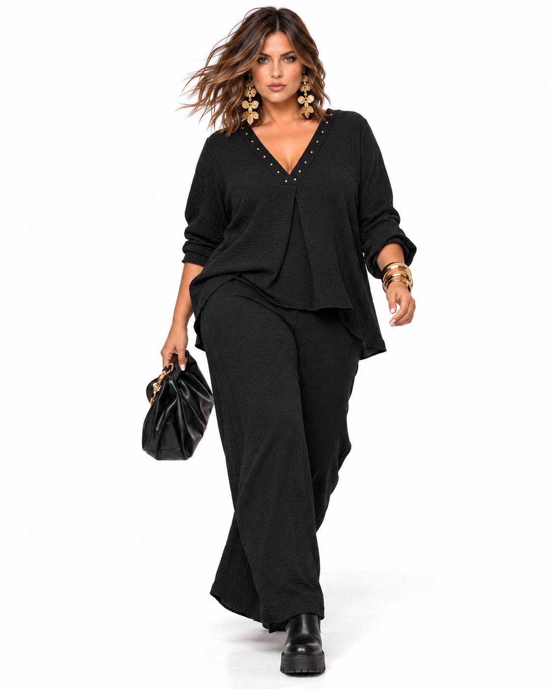 Look completo de conjunto texturizado blusa y pantalon negro