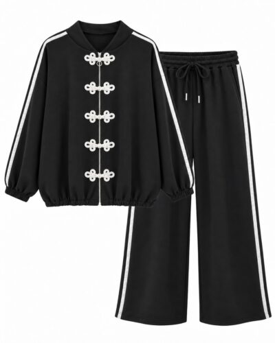 Conjunto Tokio negro de mujer curvy con chaqueta de detalles blancos y pantalón de pierna amplia