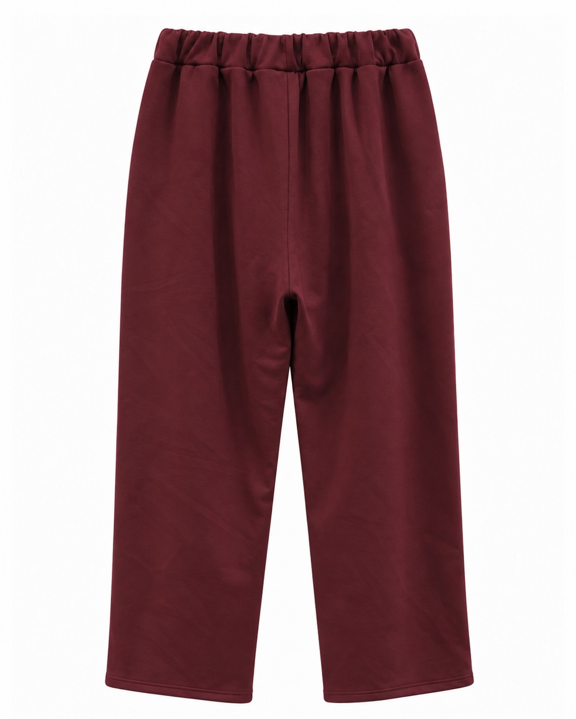 Pantalón jogger casual burdeos de mujer curvy en neopreno suave y agradable al tacto, con cintura elástica y corte relajado, vista de espalda