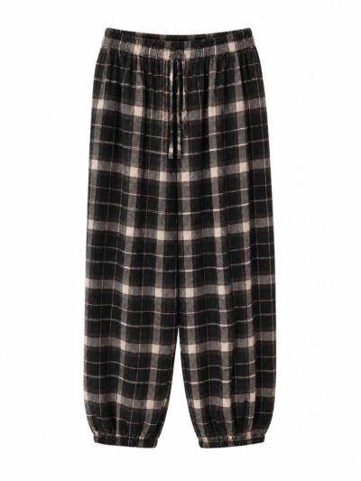 delntero pantalón marrón de cuadros escoceses con cintura y bajos elásticos.