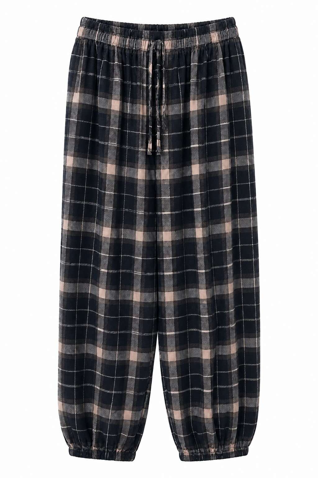 Delantero pantalón negro de cuadros escoceses con cintura y bajos elásticos.